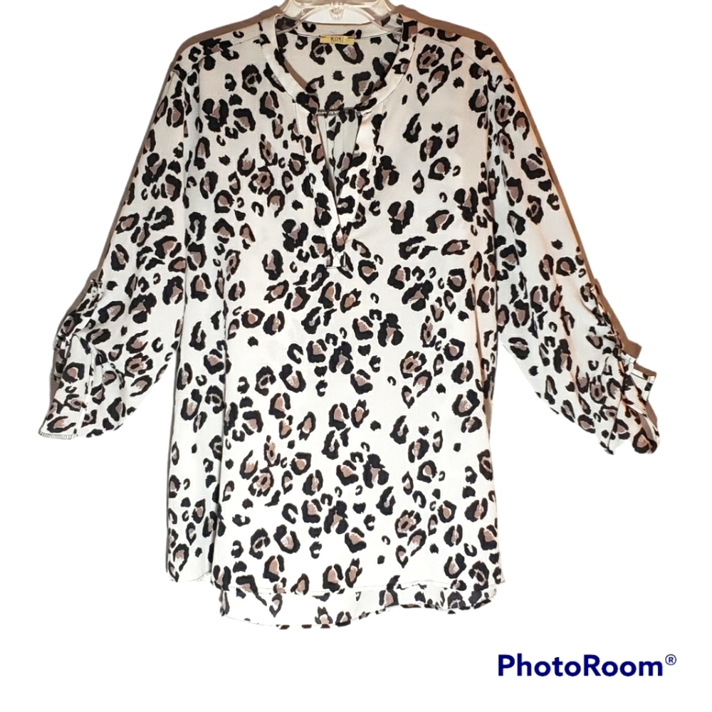 Kori women's plus size 1X pullover animal print pullover blouse. 786